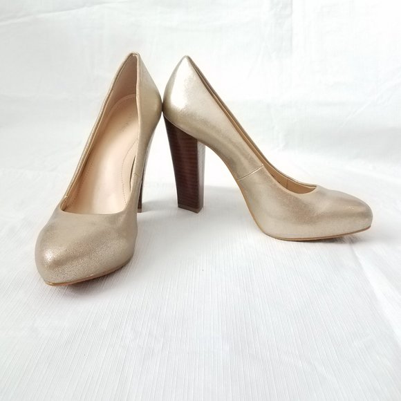 Calvin Klein Shoes - Calvin Klein Elita Gold Platform Leather Pumps